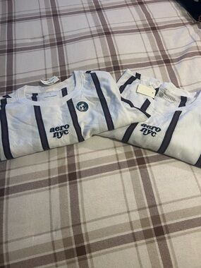 2 Men’s L Aeropostale White Tee with Navy and Burgundy Stripes 
New! With tags